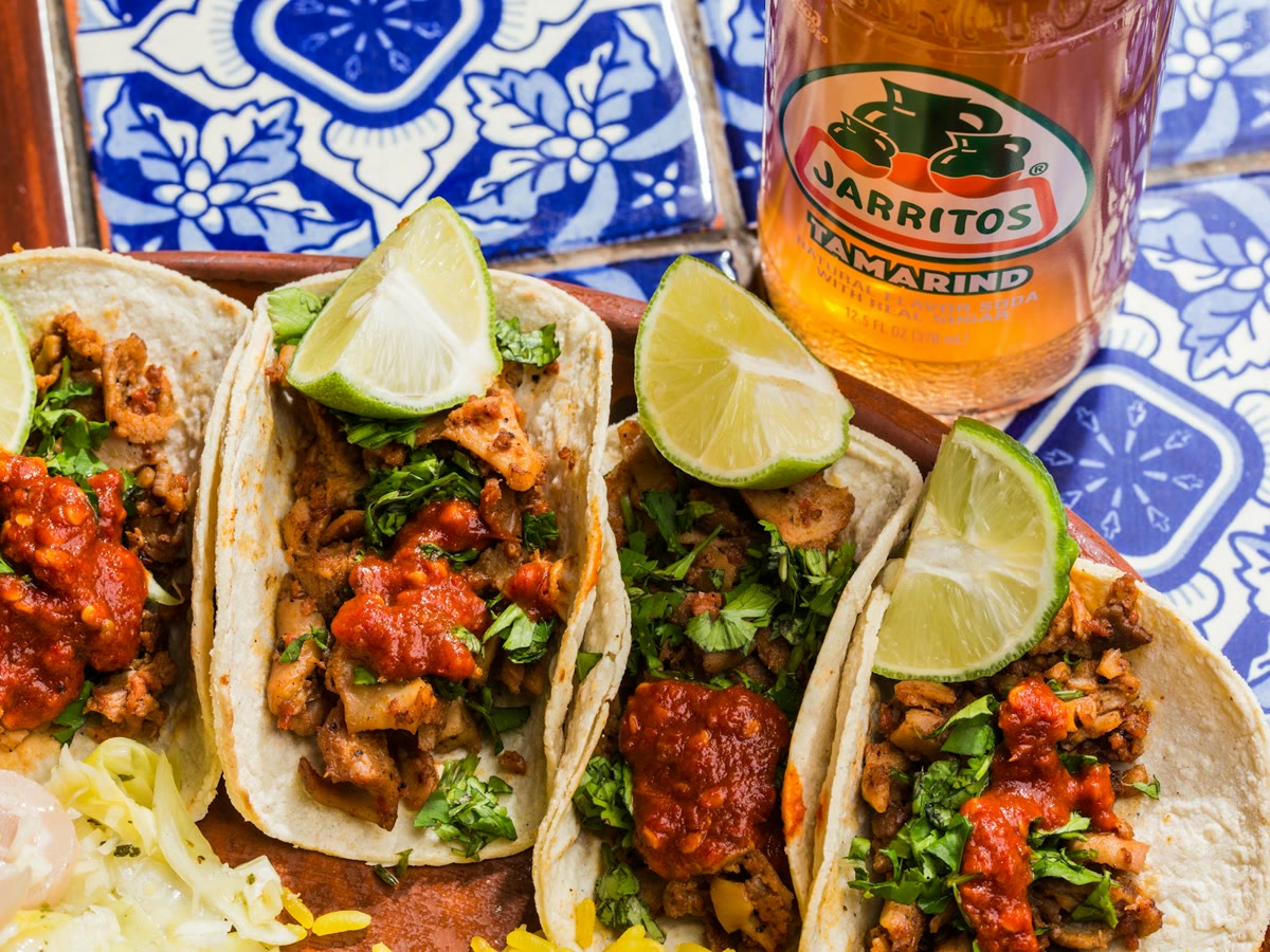 Cumin-lime beef soft tacos with peppers